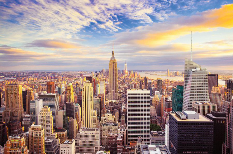 Sunset view of New York City looking over midtown Manhattan