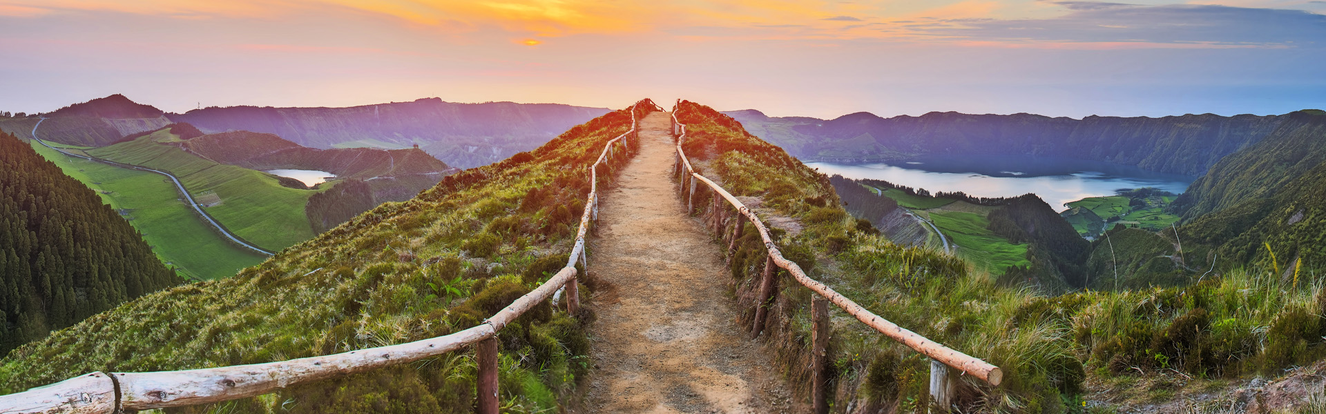 Mountain landscape with hiking trail and view of beautiful lakes, Ponta Delgada, Sao Miguel Island, Azores, Portugal.