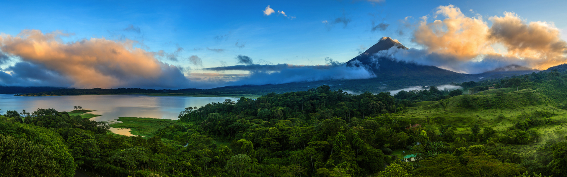 Panoramic view of Arenal Volcano and lake in central Costa Rica