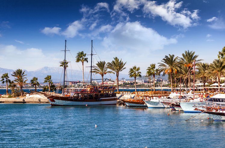 Port with sightseeing boats, beautiful scenery, Resort town Side in Turkey