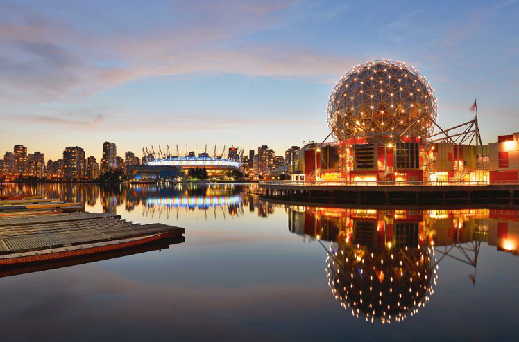 Vancouver Science World and BC Stadium at night