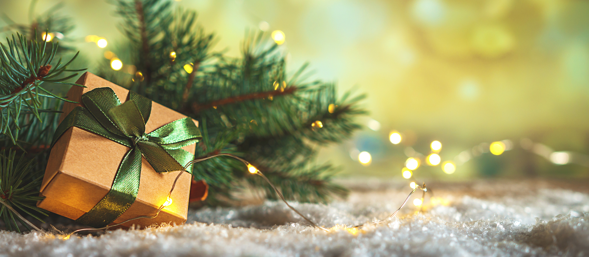 Christmas and zero waste, eco friendly packaging gifts in kraft paper on a wooden table, eco christmas holiday concept, eco decor banner